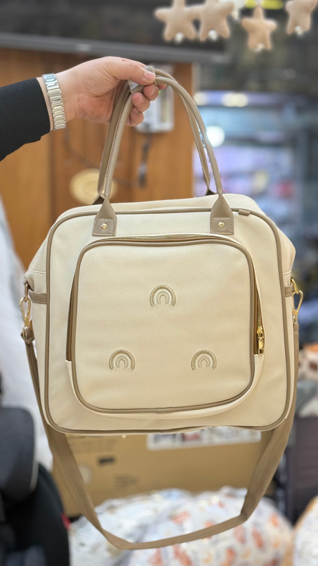 ساک لوازم نوزاد دوشی چرم با گلدوزی رنگینکمان برند Arina Room