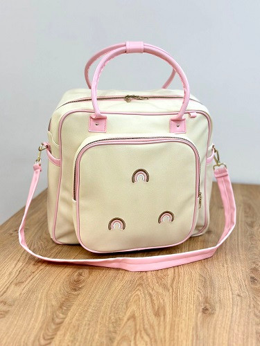 ساک لوازم نوزاد دوشی چرم با گلدوزی رنگینکمان برند Arina Room